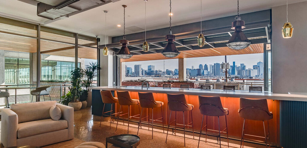 Interior design of the River Edge building with a city skyline view