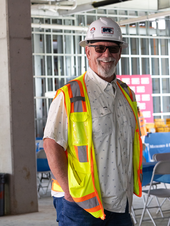 Image of M&F employee Kin Hunter smiling