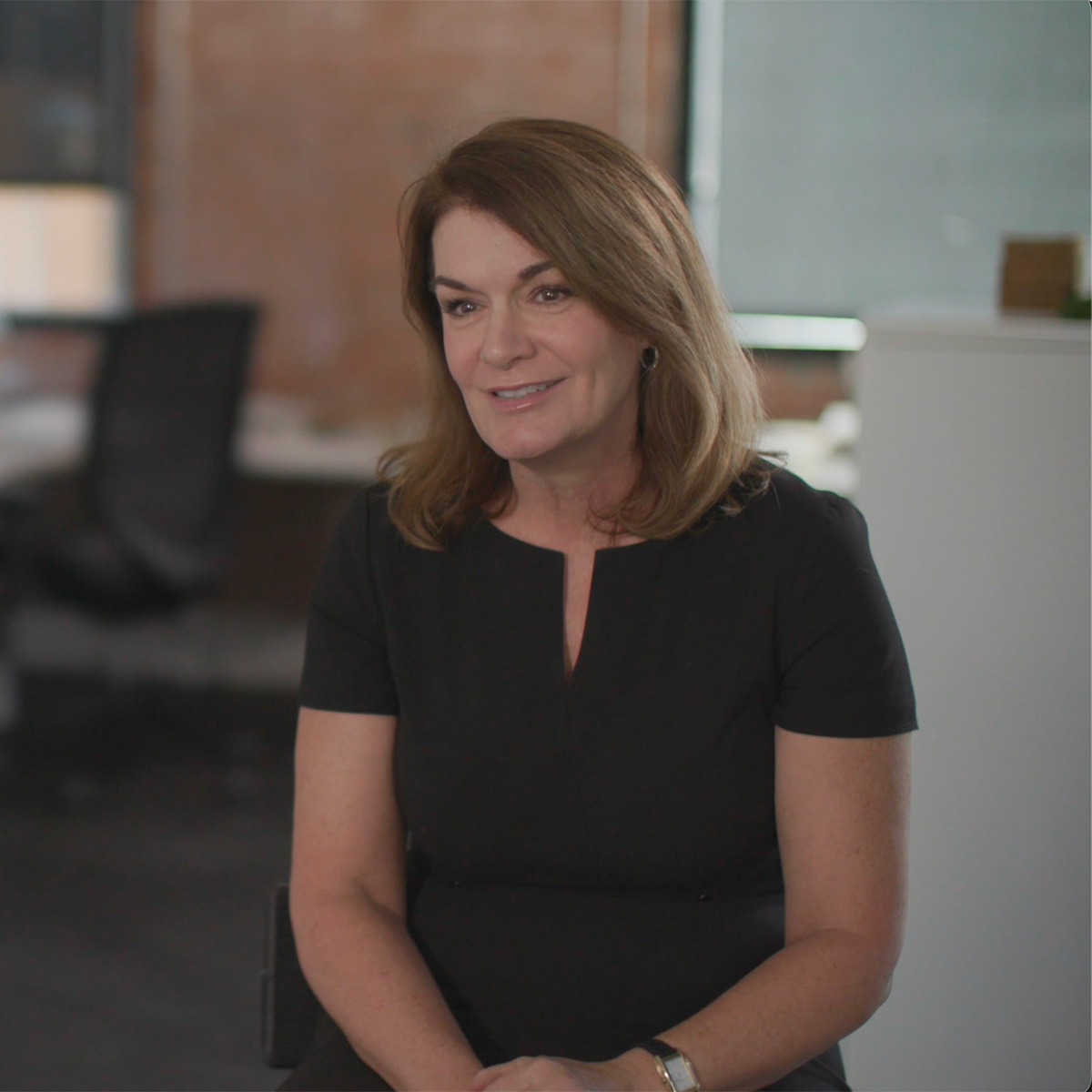 M&F employee sitting in office environment