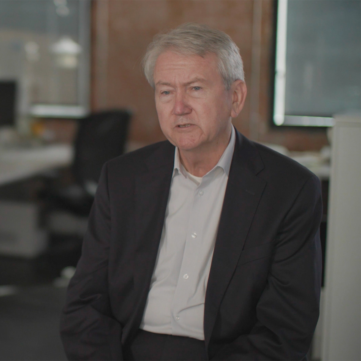 M&F employee sitting in office environment
